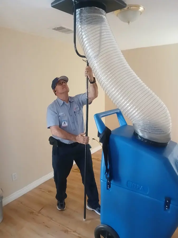 Mini Split Installation technician using HEPA equipment in Rossmoor